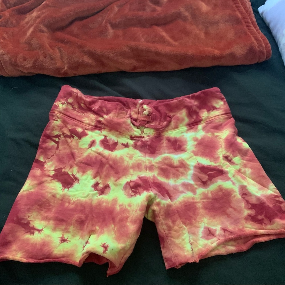 red and yellow tie dye sweat shorts